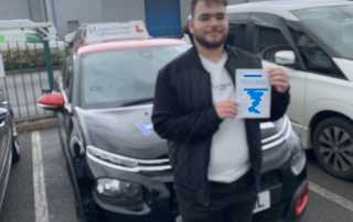 This is Anas looking pleased with his achievement of a driving test pass, as well he should.